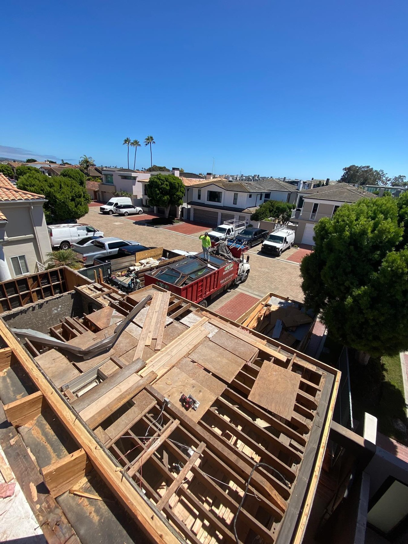 Exposed roof framing after GT Demolition removed roofing on a Lido Island home